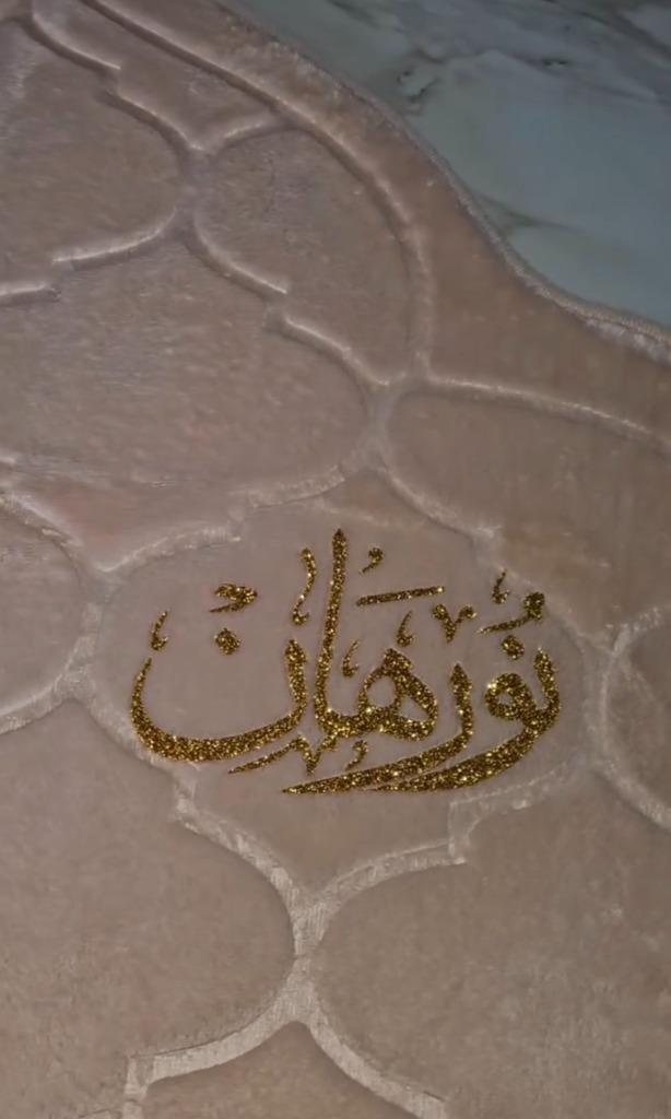 Pink silk prayer rug with gold glitter Arabic name calligraphy