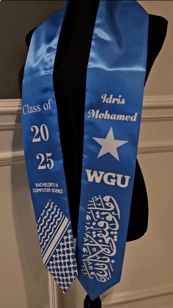 Sky blue graduation stole with white Arabic calligraphy and Somalia flag